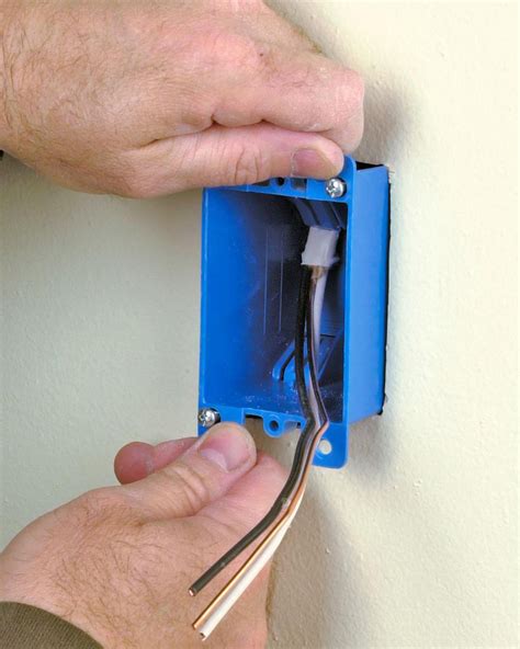 adding a line to an electrical box|installing electrical box in wall.